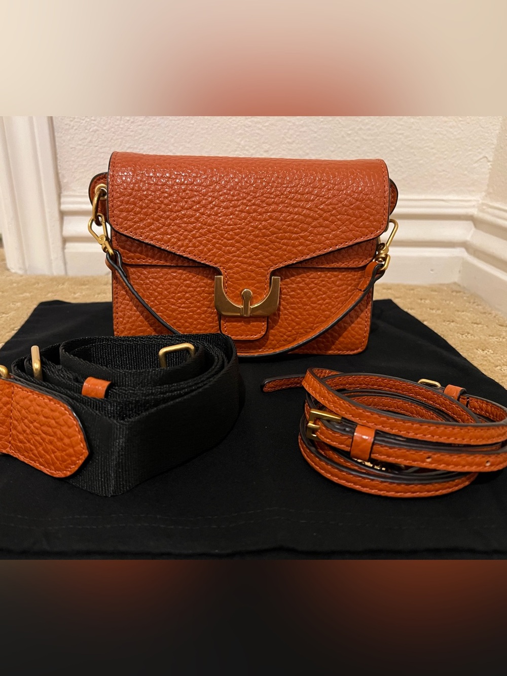 Coccinelle Ambrine Pebbled Leather Crossbody Bag in Burnt Orange
